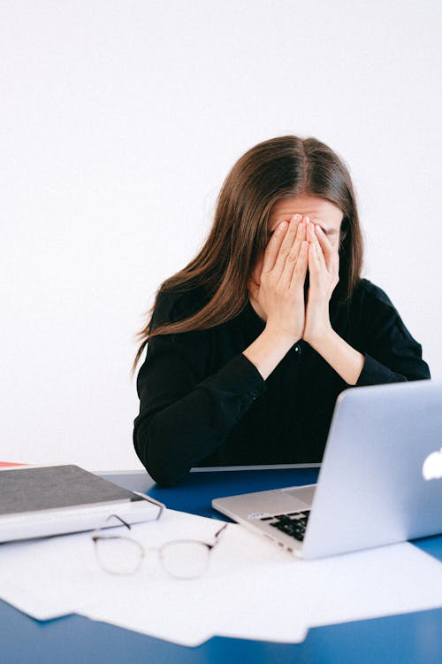 Woman Covering Her Face