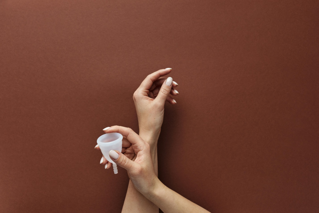 Person Holding a Menstrual Cup 