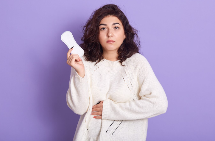 Woman Holding Sanitary Pads