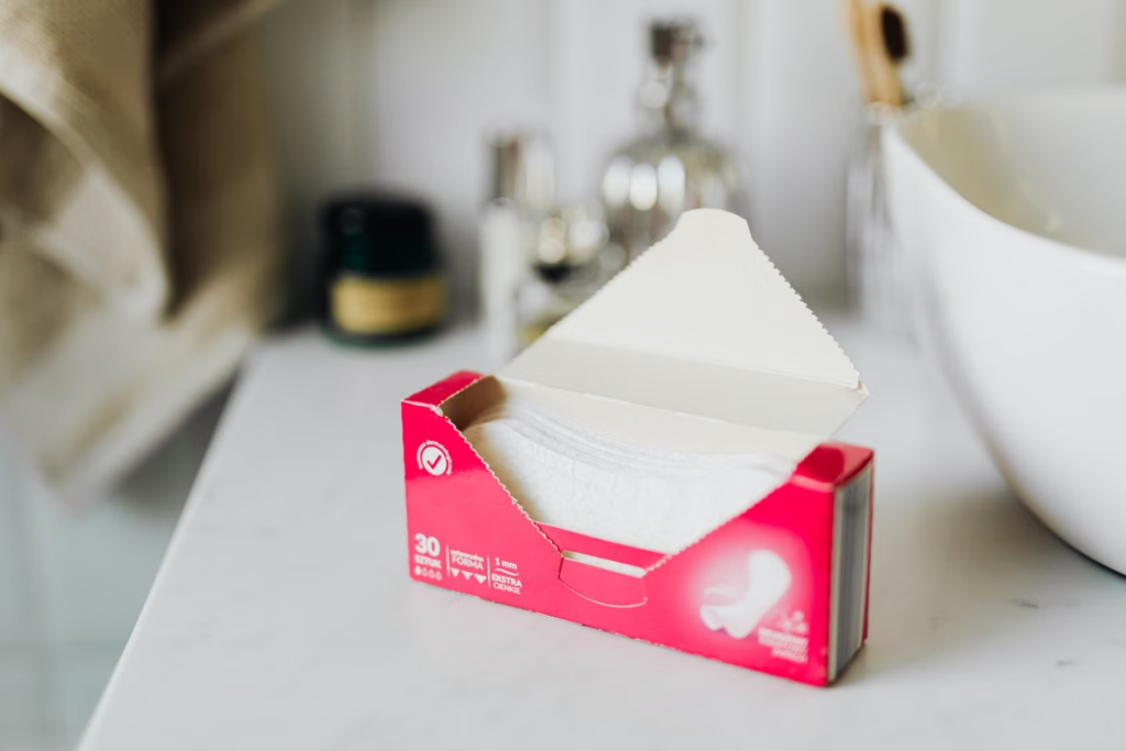 This photo shows some sanitary napkins in a bathroom.